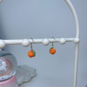 Handmade micro-crocheted orange dangle earrings